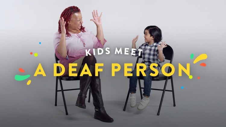 Kids interview a deaf person
